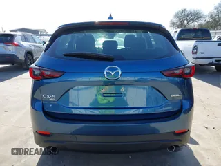 2023 Mazda CX-5 2.5 S with VIN JM3KFBAM4P0281628, listed as a IAAI auction lot 41724158 with 6,013 mi miles. Bid and sale history available at carsss.com. Image 17.