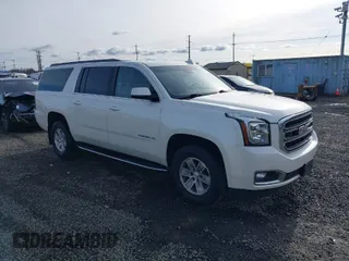 2015 GMC Yukon XL SLT with VIN 1GKS2HKC3FR586338, listed as a IAAI auction lot 41632662 with 149,133 mi miles. Bid and sale history available at carsss.com. Image 1.
