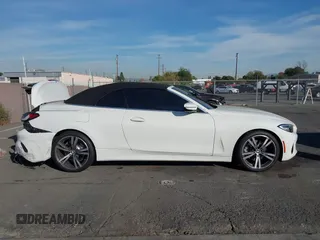 2023 BMW 4 Series 430i with VIN WBA23AT05PCM33899, listed as a IAAI auction lot 41119359 with 1 mi miles. Bid and sale history available at carsss.com. Image 13.