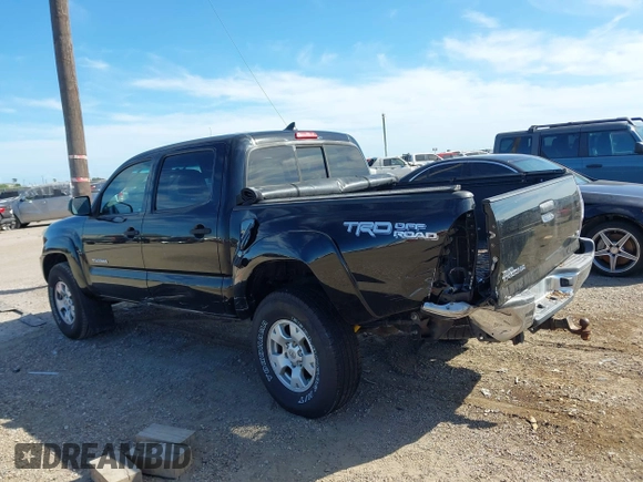 2015 Toyota Tacoma with VIN 3TMLU4EN2FM169326, listed as a IAAI auction lot 40689500 with 77,003 mi miles and . Bid and sale history available at DreamBid. Image 14.