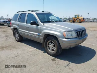 2000 Jeep Grand Cherokee Limited with VIN 1J4GW58N5YC361724, listed as a IAAI auction lot 42722980 with 136,590 mi miles and . Bid and sale history available at DreamBid. Image 1.