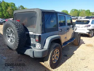 2017 Jeep Wrangler Unlimited Sport z VIN 1C4BJWDG2HL714822, wystawiony jako IAAI lot #41967673 z przebiegiem 95 165 mil mil oraz . Historia ofert i sprzedaży dostępna na DreamBid. Obrazek 4.
