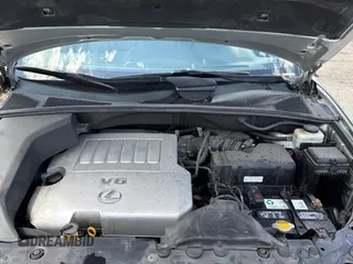 2007 Lexus RX 350 z VIN 2T2HK31U07C044365, wystawiony jako Copart lot #58370465 z przebiegiem 131 579 mil mil oraz Czysty tytuł • Clean title. Historia ofert i sprzedaży dostępna na DreamBid. Obrazek 7.