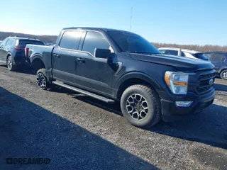 2021 Ford F-150 XL with VIN 1FTEW1EP2MFA98662, listed as a IAAI auction lot 41417235 with 69,282 mi miles. Bid and sale history available at carsss.com. Image 1.
