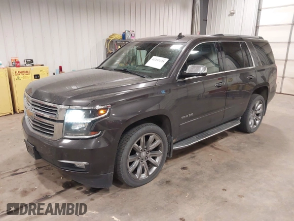 2016 Chevrolet Tahoe LTZ with VIN 1GNSKCKC1GR201155, listed as a IAAI auction lot 42235228 with 184,585 mi miles and . Bid and sale history available at DreamBid. Image 18.