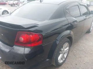 2014 Dodge Avenger SE with VIN 1C3CDZAB2EN229221, listed as a IAAI auction lot 42632298 with 163,229 mi miles and . Bid and sale history available at DreamBid. Image 4.