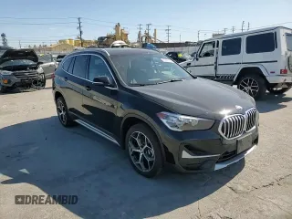 2021 BMW X1 sDrive28i with VIN WBXJG7C03M5T10112, listed as a Copart auction lot 49386695 with 46,869 mi miles and Salvage Title. Bid and sale history available at DreamBid. Image 11.