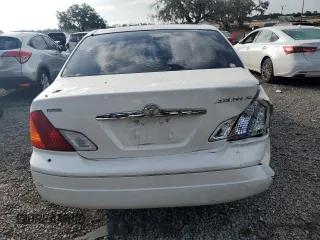 2000 Toyota Avalon XL с VIN 4T1BF28B6YU077691, выставлен на аукционе Copart как лот 61427355 с пробегом 89 670 миль миль и Списание • Salvage title. История ставок и продаж доступна на DreamBid. Изображение 6.