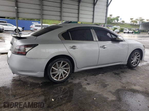 2013 Nissan Maxima SV z VIN 1N4AA5AP4DC845387, wystawiony jako Copart lot #59285485 z przebiegiem 99 719 mil mil oraz Czysty tytuł • Clean title. Historia ofert i sprzedaży dostępna na DreamBid. Obrazek 3.
