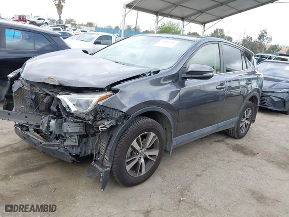 2018 Toyota RAV4 XLE with VIN JTMWFREV4JJ742463, listed as a IAAI auction lot 41920716 with 61,141 mi miles. Bid and sale history available at carsss.com. Image 2.