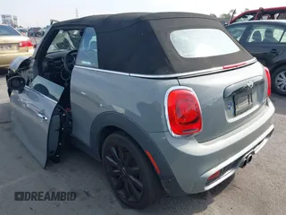 2017 MINI Convertible Cooper S z VIN WMWWG9C36H3C81439, wystawiony jako IAAI lot #41480915 z przebiegiem 64 104 mil mil oraz . Historia ofert i sprzedaży dostępna na DreamBid. Obrazek 3.