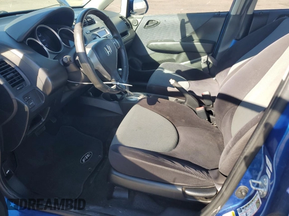 2007 Honda Fit Sport with VIN JHMGD38657S041976, listed as a Copart auction lot 48258825 with 151,075 mi miles and Salvage title. Bid and sale history available at DreamBid. Image 7.