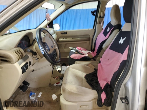2004 Ford Freestar SE z VIN 2FMZA51634BA72234, wystawiony jako Copart lot #85695414 z przebiegiem Nie podano mil oraz Szkoda całkowita • Salvage title. Historia ofert i sprzedaży dostępna na DreamBid. Obrazek 7.