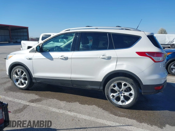 2013 Ford Escape Titanium with VIN 1FMCU0J96DUA71857, listed as a IAAI auction lot 41877003 with 118,864 mi miles and . Bid and sale history available at carsss.com. Image 14.