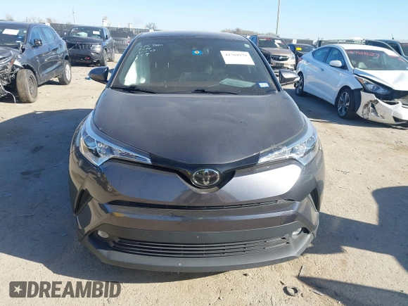 2019 Toyota C-HR XLE with VIN JTNKHMBX1K1062180, listed as a IAAI auction lot 41769979 with 75,159 mi miles. Bid and sale history available at carsss.com. Image 12.