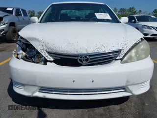 2006 Toyota Camry STD with VIN 4T1BE32KX6U734944, listed as a IAAI auction lot 42006245 with 243,967 mi miles. Bid and sale history available at carsss.com. Image 6.