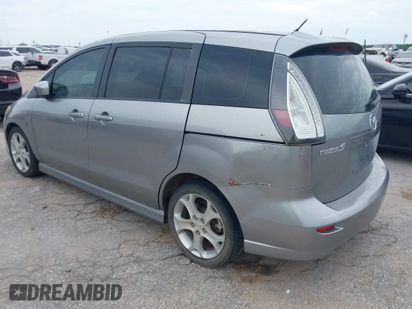 2010 Mazda 5 Sport with VIN JM1CR2WL8A0387155, listed as a IAAI auction lot 42773874 with 146,418 mi miles and . Bid and sale history available at DreamBid. Image 3.