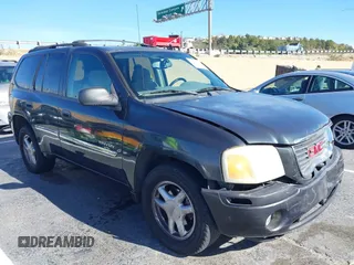 2006 GMC Envoy SLT with VIN 1GKDS13S962184712, listed as a IAAI auction lot 41250740 with 226,986 mi miles. Bid and sale history available at carsss.com. Image 1.