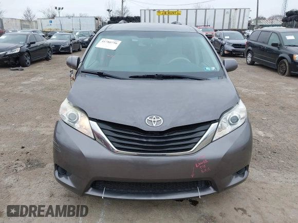 2012 Toyota Sienna LE with VIN 5TDJK3DCXCS047056, listed as a IAAI auction lot 41780756 with 179,624 mi miles. Bid and sale history available at carsss.com. Image 13.