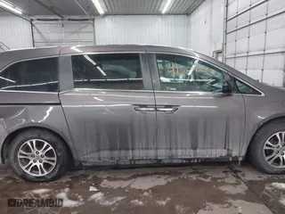 2012 Honda Odyssey EX-L with VIN 5FNRL5H66CB101151, listed as a IAAI auction lot 41504250 with 261,836 mi miles. Bid and sale history available at carsss.com. Image 13.