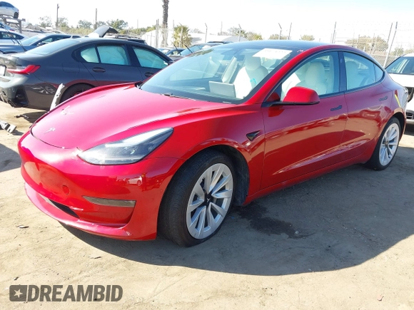 2021 Tesla Model 3 Long Range with VIN 5YJ3E1EBXMF990242, listed as a IAAI auction lot 41674222 with 24,554 mi miles and . Bid and sale history available at DreamBid. Image 2.