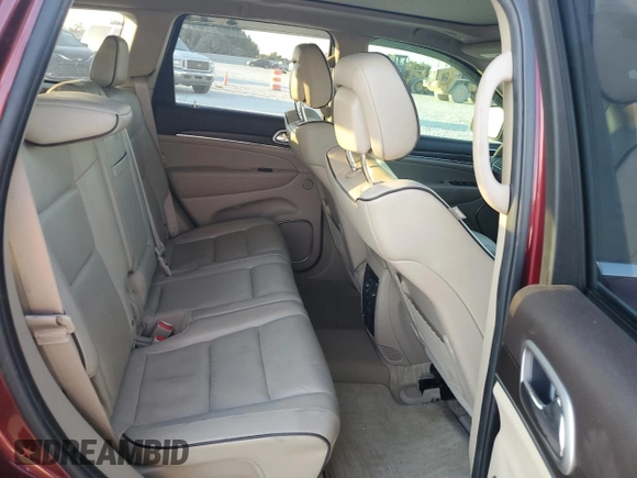 2018 Jeep Grand Cherokee Overland with VIN 1C4RJFCT3JC453784, listed as a Copart auction lot 71921944 with 56,097 mi miles and Salvage title. Bid and sale history available at DreamBid. Image 11.