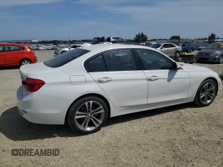 2018 BMW 3 Series 330i xDrive with VIN WBA8D9G56JNU71570, listed as a Copart auction lot 54071565 with 73,305 mi miles and Salvage title. Bid and sale history available at DreamBid. Image 3.