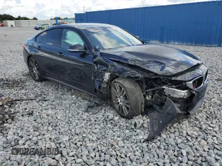2016 BMW 4 Series 428i with VIN WBA4A9C51GG507109, listed as a Copart auction lot 61781215 with 126,940 mi miles and Salvage title. Bid and sale history available at DreamBid. Image 4.