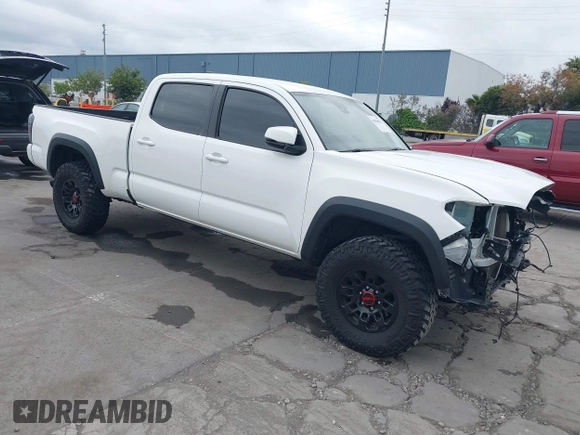 2021 Toyota Tacoma SR5 z VIN 3TMDZ5BN2MM100245, wystawiony jako IAAI lot #42078914 z przebiegiem 58 153 mil mil oraz . Historia ofert i sprzedaży dostępna na DreamBid. Obrazek 1.