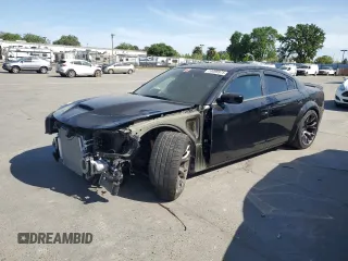 2020 Dodge Charger SRT Hellcat z VIN 2C3CDXL90LH243946, wystawiony jako Copart lot #53099975 z przebiegiem 9 297 mil mil oraz Szkoda całkowita • Salvage title. Historia ofert i sprzedaży dostępna na DreamBid. Obrazek 1.