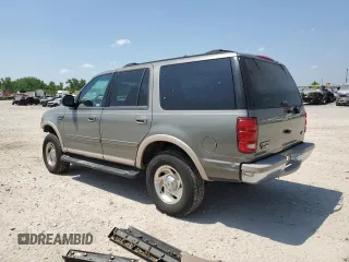 1999 Ford Expedition XLT z VIN 1FMPU18L0XLC03675, wystawiony jako Copart lot #56721435 z przebiegiem 111 652 mil mil oraz Szkoda całkowita • Salvage title. Historia ofert i sprzedaży dostępna na DreamBid. Obrazek 2.