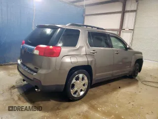 2011 GMC Terrain SLT-1 z VIN 2CTFLUE56B6413021, wystawiony jako Copart lot #56991895 z przebiegiem 263 832 mil mil oraz Czysty tytuł • Clean title. Historia ofert i sprzedaży dostępna na DreamBid. Obrazek 3.