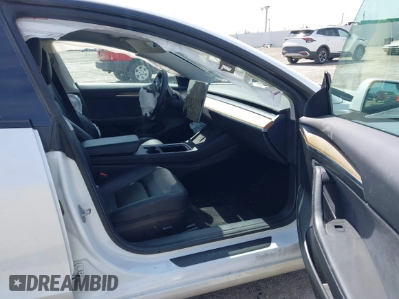 2021 Tesla Model 3 Performance with VIN 5YJ3E1EC8MF044388, listed as a IAAI auction lot 41821892 with Not Provided miles and . Bid and sale history available at carsss.com. Image 5.