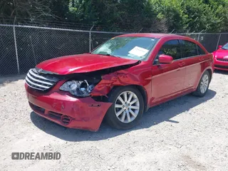 2010 Chrysler Sebring Limited with VIN 1C3CC5FB8AN133656, listed as a IAAI auction lot 42561161 with 145,785 mi miles and . Bid and sale history available at DreamBid. Image 19.