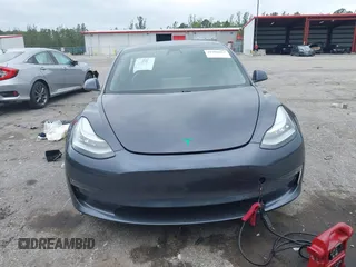 2021 Tesla Model 3 Long Range with VIN 5YJ3E1EBXMF836789, listed as a IAAI auction lot 41900027 with 71,086 mi miles. Bid and sale history available at carsss.com. Image 12.