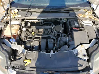 2014 Ford Focus Titanium z VIN 1FADP3N2XEL263357, wystawiony jako Copart lot #84610634 z przebiegiem 142 023 mil mil oraz Nie do naprawy • Non repairable. Historia ofert i sprzedaży dostępna na DreamBid. Obrazek 13.