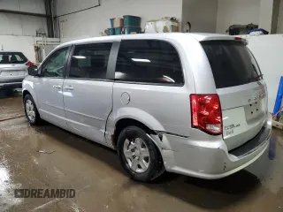 2012 Dodge Grand Caravan SE with VIN 2C4RDGBG5CR312016, listed as a Copart auction lot 52887255 with 96,355 mi miles and Salvage Title. Bid and sale history available at DreamBid. Image 2.
