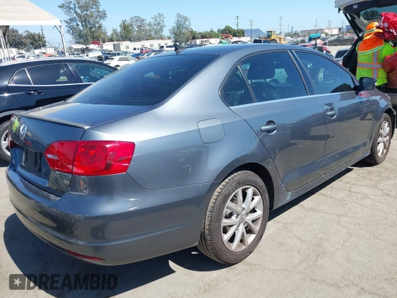 2013 Volkswagen Jetta SE with VIN 3VWDP7AJ8DM436818, listed as a IAAI auction lot 42386196 with 121,043 mi miles and . Bid and sale history available at DreamBid. Image 4.