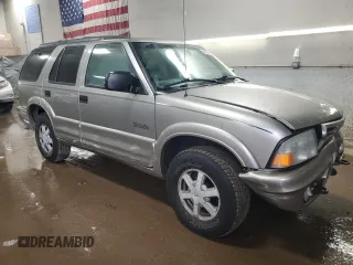 2001 Oldsmobile Bravada z VIN 1GHDT13W212196750, wystawiony jako Copart lot #44019065 z przebiegiem 126 878 mil mil oraz Szkody całkowita. Historia ofert i sprzedaży dostępna na DreamBid. Obrazek 4.