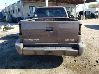 1998 GMC Sonoma SLS with VIN 1GTCS19X2W8516898, listed as a Copart auction lot 43939394 with 257,328 mi miles and Salvage Title. Bid and sale history available at DreamBid. Image 6.