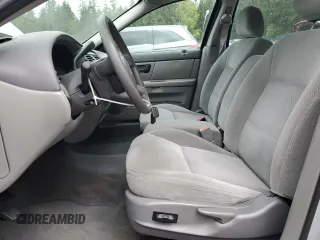 2004 Mercury Sable GS z VIN 1MEFM50U34G601378, wystawiony jako Copart lot #56952825 z przebiegiem 63 456 mil mil oraz Tytuł czysty. Historia ofert i sprzedaży dostępna na DreamBid. Obrazek 7.