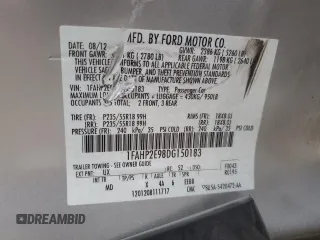 2013 Ford Taurus SEL with VIN 1FAHP2E98DG150183, listed as a Copart auction lot 87481264 with 74,065 mi miles and Salvage Title. Bid and sale history available at DreamBid. Image 12.
