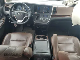 2015 Toyota Sienna Limited с VIN 5TDDK3DC6FS116164, выставлен на аукционе Copart как лот 63149625 с пробегом 92 786 миль миль и Списание • Salvage title. История ставок и продаж доступна на DreamBid. Изображение 8.