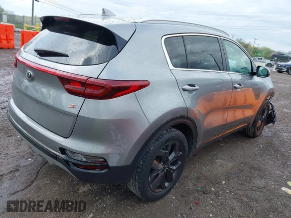 2020 Kia Sportage S with VIN KNDP6CAC9L7703731, listed as a IAAI auction lot 41951027 with 76,771 mi miles. Bid and sale history available at carsss.com. Image 4.