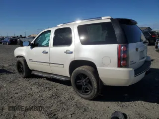 2011 GMC Yukon Denali with VIN 1GKS2EEF9BR384327, listed as a Copart auction lot 73546994 with 175,114 mi miles and Salvage Title. Bid and sale history available at carsss.com. Image 2.