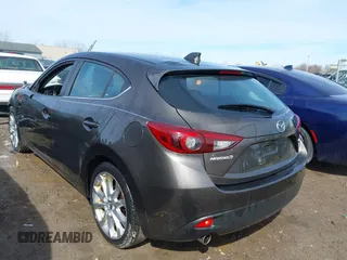 2014 Mazda 3 S Grand Touring with VIN JM1BM1M39E1149581, listed as a IAAI auction lot 41813917 with 143,019 mi miles and . Bid and sale history available at DreamBid. Image 3.