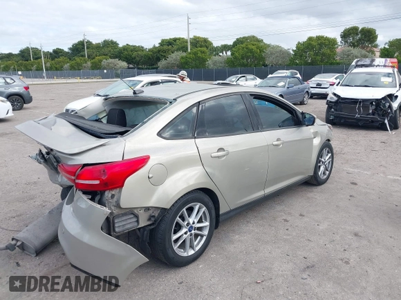 2015 Ford Focus SE with VIN 1FADP3F29FL292655, listed as a IAAI auction lot 41090945 with 106,060 mi miles. Bid and sale history available at carsss.com. Image 13.
