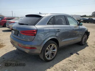 2015 Audi Q3 Prestige with VIN WA1GFCFS8FR009731, listed as a Copart auction lot 59897225 with 84,138 mi miles and Salvage title. Bid and sale history available at DreamBid. Image 3.