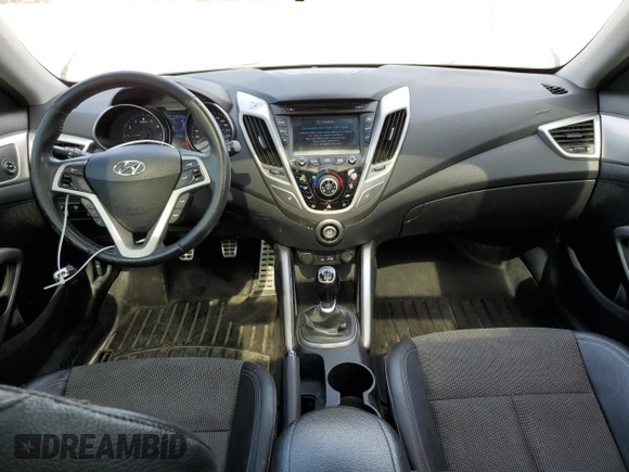 2013 Hyundai Veloster w/Black Int с VIN KMHTC6AD4DU139261, выставлен на аукционе Copart как лот 56175095 с пробегом 148 483 миль миль и Чистый • Clean title. История ставок и продаж доступна на DreamBid. Изображение 8.