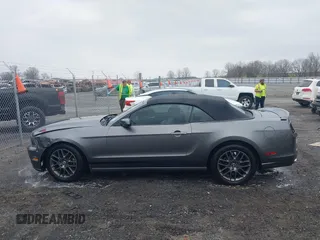 2014 Ford Mustang V6 with VIN 1ZVBP8EM1E5228353, listed as a IAAI auction lot 41525666 with 138,024 mi miles. Bid and sale history available at carsss.com. Image 14.